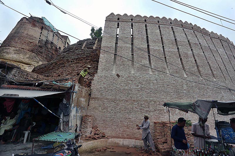 A labour busy in construction work of Pakka Fort