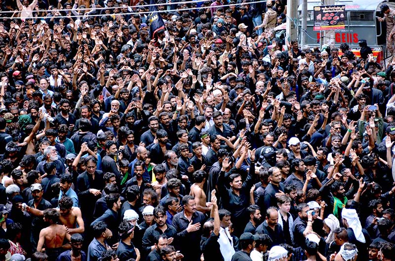 A large number of Shiite Muslims participate in 10th Muharram procession to mark Ashoura at Mehfil-e-Husseini Road. Ashoura is the commemoration marking the Shahadat (death) of Hussein (AS), the grandson of the Prophet Muhammad (PBUH), with his family members during the battle of Karbala for the upright of Islam