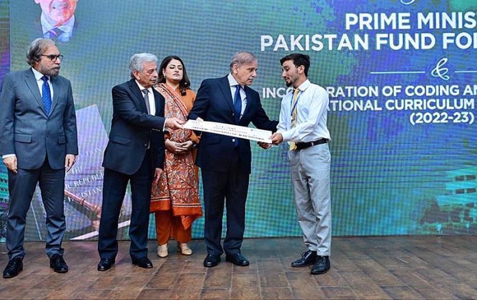 Prime Minister Muhammad Shehbaz Sharif distributes scholarship cheques among high-achieving students on merit basis under the Pakistan Endowment Fund for Education