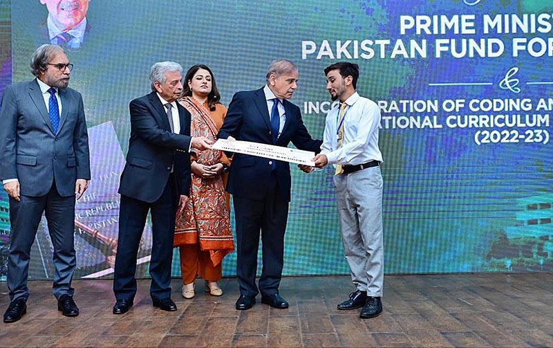 Prime Minister Muhammad Shehbaz Sharif distributes scholarship cheques among high-achieving students on merit basis under the Pakistan Endowment Fund for Education