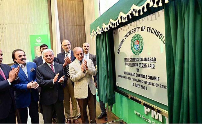 Prime Minister Muhammad Shehbaz Sharif unveiling a plaque to mark the ground breaking of the main campus of National University of Technology (NUTECH)