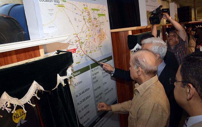 Prime Minister Muhammad Shehbaz Sharif unveils a plaque during the groundbreaking of multiple infrastructure development projects