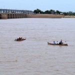 Families enjoying boat riding during their visit at Indus River