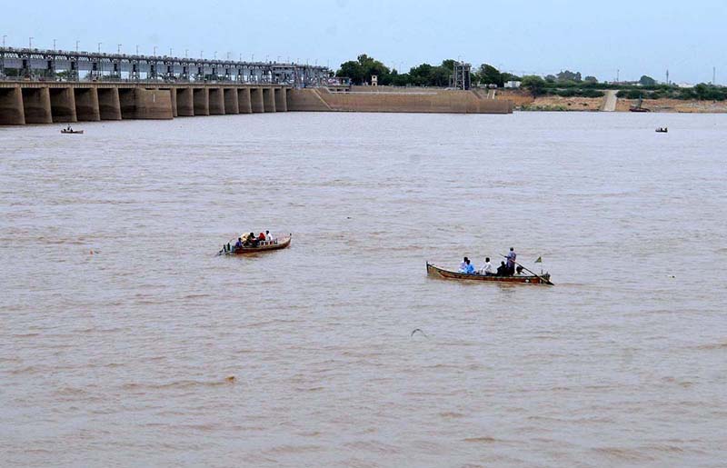 Families enjoying boat riding during their visit at Indus River