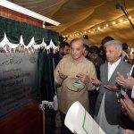 Prime Minister Muhammad Shehbaz Sharif unveils a plaque during the groundbreaking Pakistan Scouts Cadet College