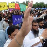 All Pakistan Traders association and Traders action Committee holding the protest during Quran Sanctification Day outside Islamabad press club as they protest against the burning of the Quran outside a Stockholm mosque that outraged Muslims around the world