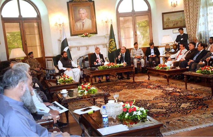 Prime Minister Shehbaz Sharif addressing Chamber Of Commerce Committee at Governor House