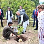 President Dr. Arif Alvi planting a sapling as part of monsoon plantation season at Aiwan-e-Sadr