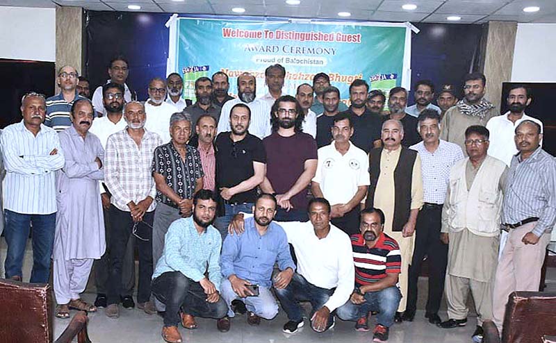 Baloch political leader Mir Chaakar Bhugti and President RIPJA (Professional) Sajjad Haider in a group with the participants of Annual Training Workshop for the members of Rawalpindi Islamabad Photojournalist Association (Professional) at PID media centre