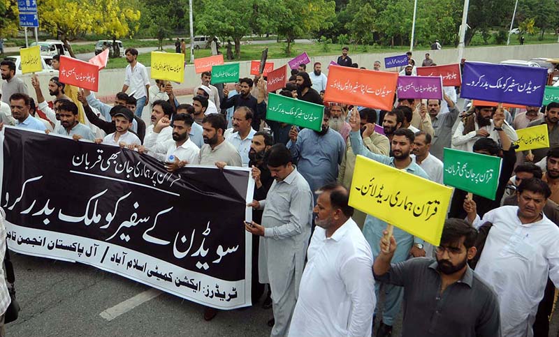 All Pakistan Traders association and Traders action Committee holding the protest during Quran Sanctification Day outside Islamabad press club as they protest against the burning of the Quran outside a Stockholm mosque that outraged Muslims around the world