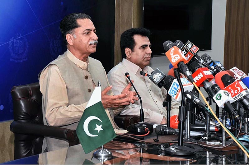 Federal Minister, Mian Javed Latif, addressing a press conference
