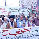 Activists of Majlis Wahdat-e-Muslimeen take part in a protest demonstration at Karachi Press Club against the burning of holy Quran outside a Stockholm Mosque