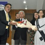 Federal Minister for Education & Professional Training Rana Tanveer Hussain giving gift hamper to position holder during the Result Declaration ceremony SSC Part I&II 1st Annual Exam 2023 at FBISE