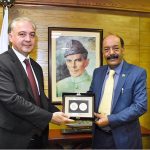 Federal Minister for Defence Production, Muhammad Israr Tareen is presenting a souvenir to Mr. Khalid Ahadov, Advisor to President of Azerbaijan at MoDP