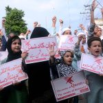 Children of civil society are protesting outside Lahore Press club against the desecration of Holy Quran in Sweden