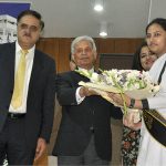 Federal Minister for Education & Professional Training Rana Tanveer Hussain giving gift hamper to position holder during the Result Declaration ceremony SSC Part I&II 1st Annual Exam 2023 at FBISE
