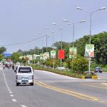 Billboard and Pak-China flags are being displayed at Srinagar Highway in connection with 10 years celebration of CPEC