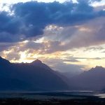 An eye catching view of sunset over the mountain along with river Indus