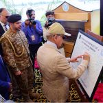 Prime Minister Muhammad Shehbaz Sharif signing a commemorative board during the groundbreaking ceremony of the 5th unit of Chashma Nuclear Power plant (C-5) in Chashma