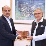 Rear Admiral Rizwan Ahmed DG Naval Intelligences called on Finance Minister Senator Mohammad Ishaq Dar and presented memento to the Finance Minister at Finance Division