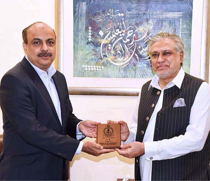 Rear Admiral Rizwan Ahmed DG Naval Intelligences called on Finance Minister Senator Mohammad Ishaq Dar and presented memento to the Finance Minister at Finance Division
