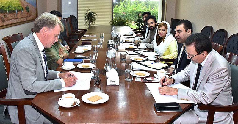 Secretary Senate, Mohammad Qasim Samad Khan and Mr. Chris Kaye, Country Director, UN-WFP signing the Memorandum Of Understanding (MOU) between Senate Secretariat and UN World Food Program (UN-WFP) at Parliament House