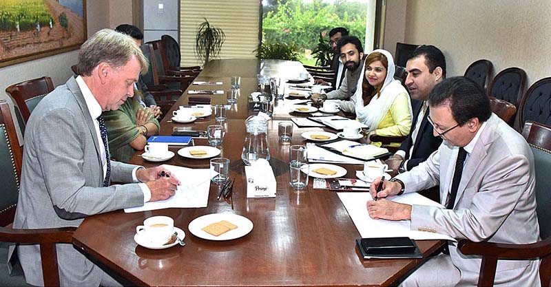 Secretary Senate, Mohammad Qasim Samad Khan and Mr. Chris Kaye, Country Director, UN-WFP signing the Memorandum Of Understanding (MOU) between Senate Secretariat and UN World Food Program (UN-WFP) at Parliament House