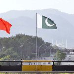 Billboard and Pak-China flags are being displayed at Srinagar Highway in connection with 10 years celebration of CPEC