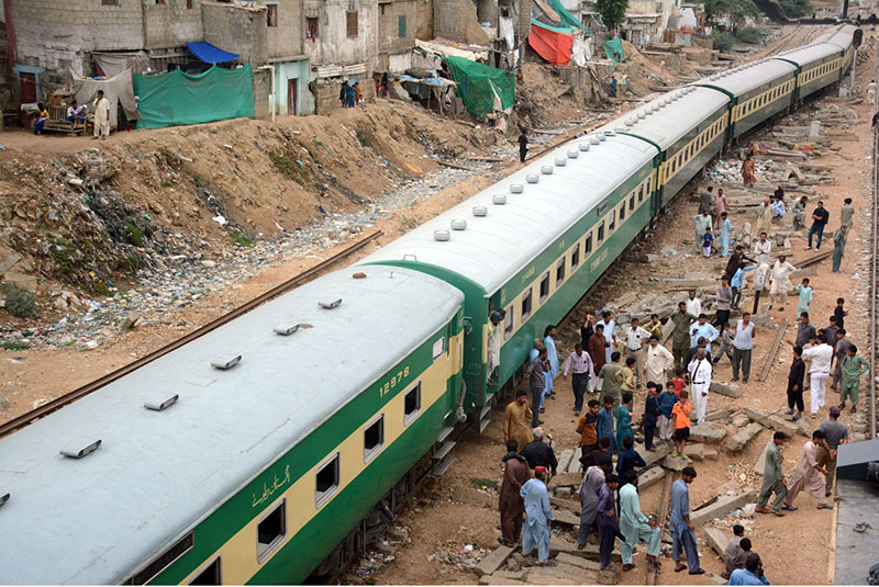 Heavy machinery being used to restore track after Pakistan Business train derailed near Kalapul