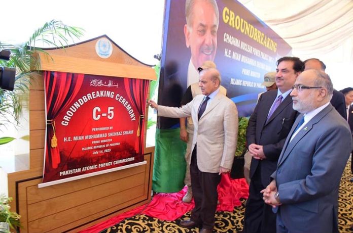 Prime Minister Muhammad Shehbaz Sharif unveiling plaque during the groundbreaking of the 5th Unit of Chashma Nuclear Power Plant (C-5) in Chashma