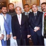 Prime Minister Shehbaz Sharif in a group photo with the delegation members of Chamber Of Commerce at Governor House