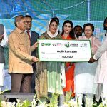 Prime Minister Muhammad Shehbaz Sharif distributing cheques among the recipients of Prime Minister's Youth Business and Agriculture Loan Scheme