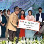 Prime Minister Muhammad Shehbaz Sharif distributing cheques among the recipients of Prime Minister's Youth Business and Agriculture Loan Scheme