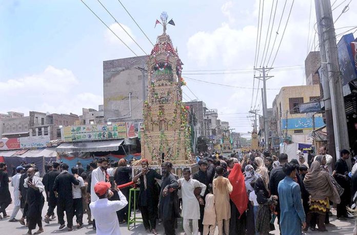 A large number of mourners attend the 10th Muharram procession to mark Ashoura. Ashoura is the commemoration marking the Shahadat (death) of Hussein (AS), the grandson of the Prophet Muhammad (PBUH), with his family members during the battle of Karbala for the upright of Islam