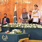 President Dr. Arif Alvi administering the oath of office to Dr. Syed Muhammad Anwer as the Alim Judge of the Federal Shariat Court at Aiwan-e-Sadr