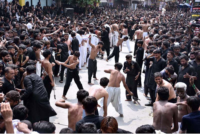 Mourners touch Zuljinah during the main procession of 9th Muharram-ul-Haram observing Youm-e-Ashur. Muharram ul Harram, the first month of the Islamic calendar is known as the mourning month to pay homage in remembrance of the martyrdom (Shahadat) of Hazrat Imam Hussain (AS), the grandson of the Holy Prophet Mohammad (SAWW), along with his family members and companions at the battle of Karbala