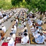 People offer Eid prayer on the occasion of 1st day of Eid-ul-Azha at Eidgah located on Charsadda Road.