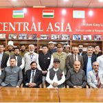 Governor Gilgit-Baltistan Syed Mehdi Shah in a group photo during the inauguration ceremony of Jani Baig Library the hero of Kargyzstan War of the Independent at KIU