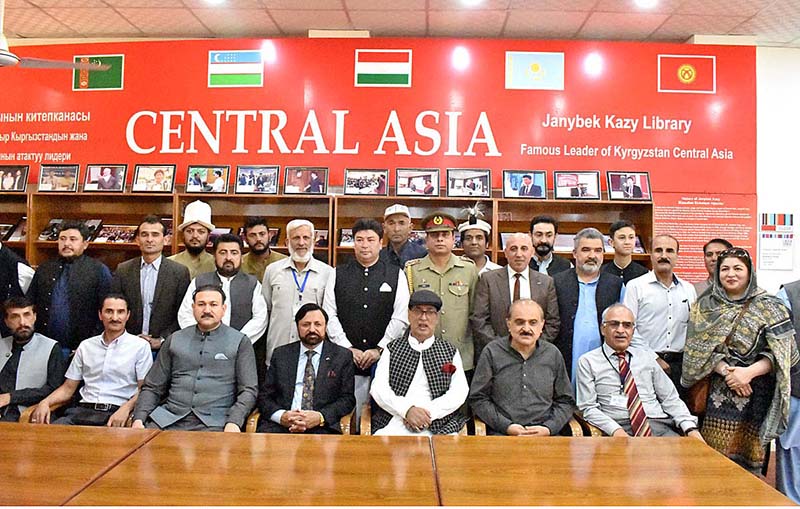 Governor Gilgit-Baltistan Syed Mehdi Shah in a group photo during the inauguration ceremony of Jani Baig Library the hero of Kargyzstan War of the Independent at KIU