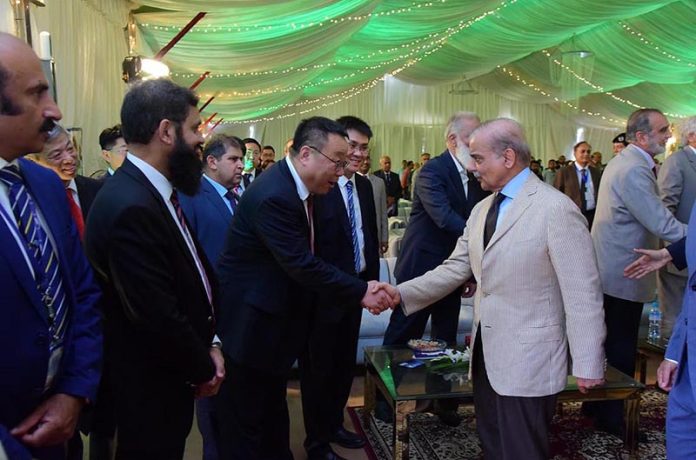 Prime Minister Muhammad Shehbaz Sharif interacts with the guests of the groundbreaking ceremony of the 5th unit of Chashma Nuclear Power plant (C-5) in Chashma