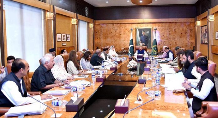 President Dr. Arif Alvi chairing a meeting regarding the framework for the classification of disabilities, at Aiwan-e-Sadr
