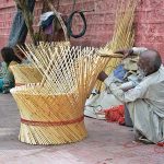 A labourer preparing traditional chairs at Dialdas Road