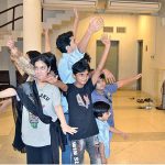 Children performing while rehearsal for drama during the Act Performance Summer Camp