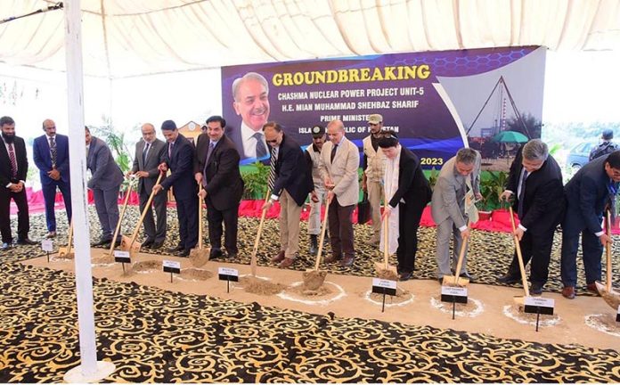 Prime Minister Muhammad Shehbaz Sharif, Federal Ministers, dignitaries from China and PAEC officials performing the ground breaking of the 5th Unit of Chashma Nuclear Power plant (C-5) in Chashma