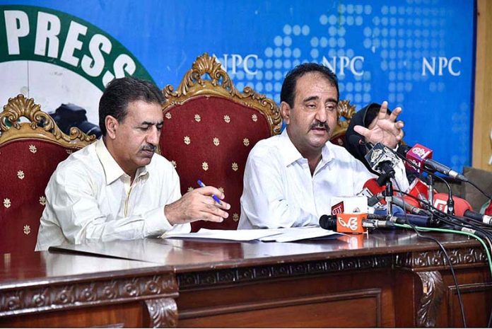 Federal Minister for Science and Technology Agha Hassan Baloch, flanked by Mr. Hashim Notezai Minister of State for Energy addressing a press conference at National Press Club