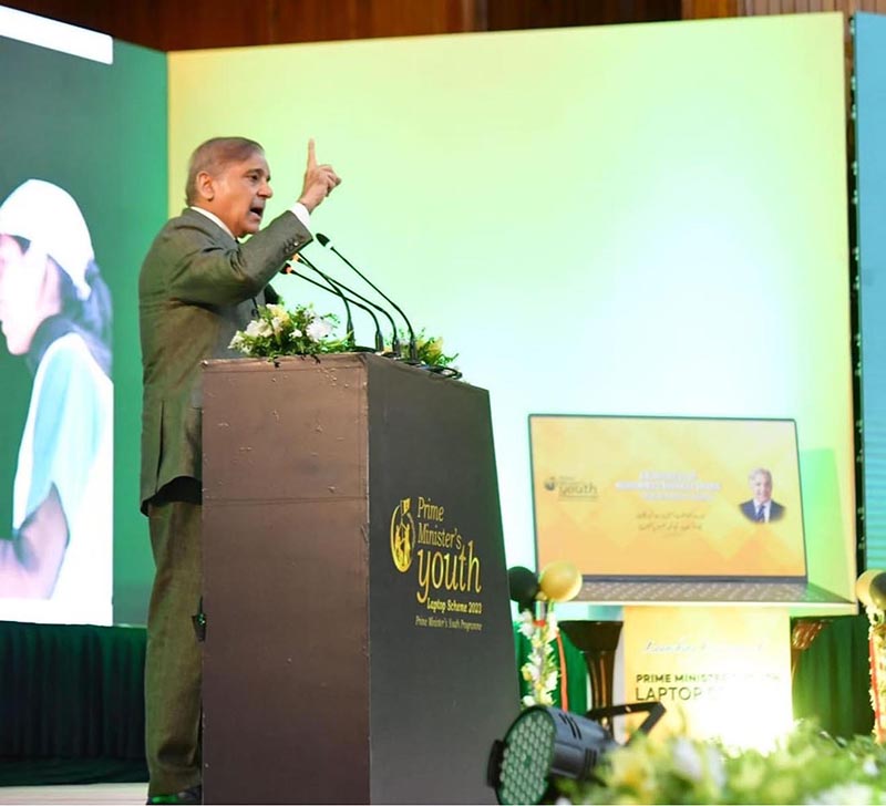 Prime Minister Muhammad Shehbaz Sharif addressing a ceremony to provide merit-based laptops to the youth of public sector universities under the Prime Minister's Youth Laptop Scheme at Jinnah Convention Centre