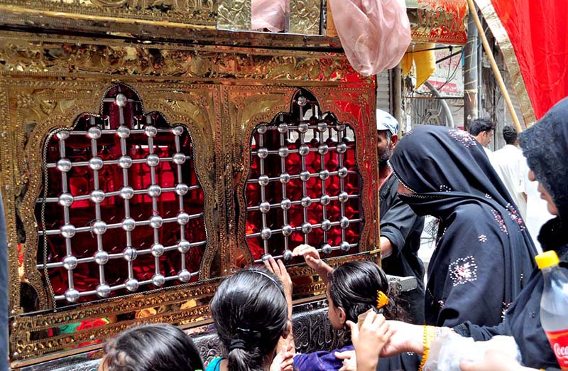 Mourners flagellate themselves with knifes on chains during the 10th Muharram procession to mark Ashoura. Ashoura is the commemoration marking the Shahadat (death) of Hussein (AS), the grandson of the Prophet Muhammad (PBUH), with his family members during the battle of Karbala for the upright of Islam