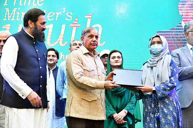 Prime Minister Muhammad Shehbaz Sharif distributes laptops among the high achievers of public sector universities under the PM's Youth Laptop Scheme at Bahauddin Zakaria University