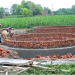 Laborers busy in construction work of sewage manhole at Suraj Miani