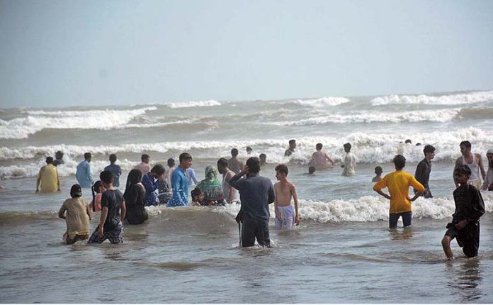 A large number of people enjoy in water and get some relief from hot weather at Seaview